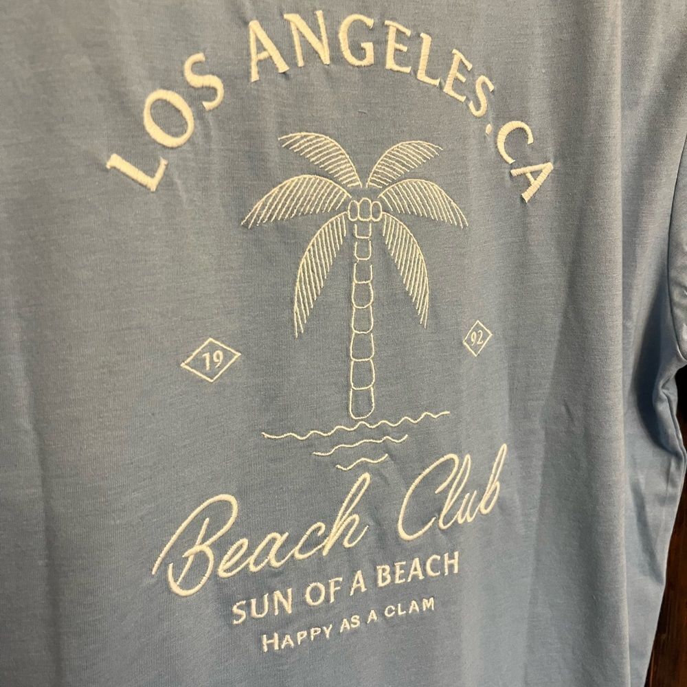 NWT Men’s Denim & Flower Ricky Singh Los Angeles Beach Club embroidered T-shirt.